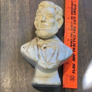 Vintage Avon Abraham Lincoln bust cologne from estate sale needs a good dusting